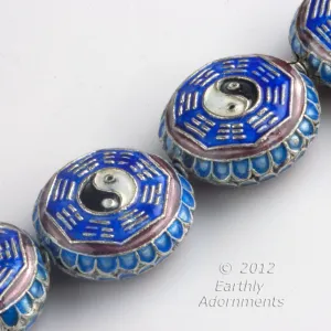 Chinese blue, red and white enamel over copper hollow ying-yang disk.  20mm.  B18-0419