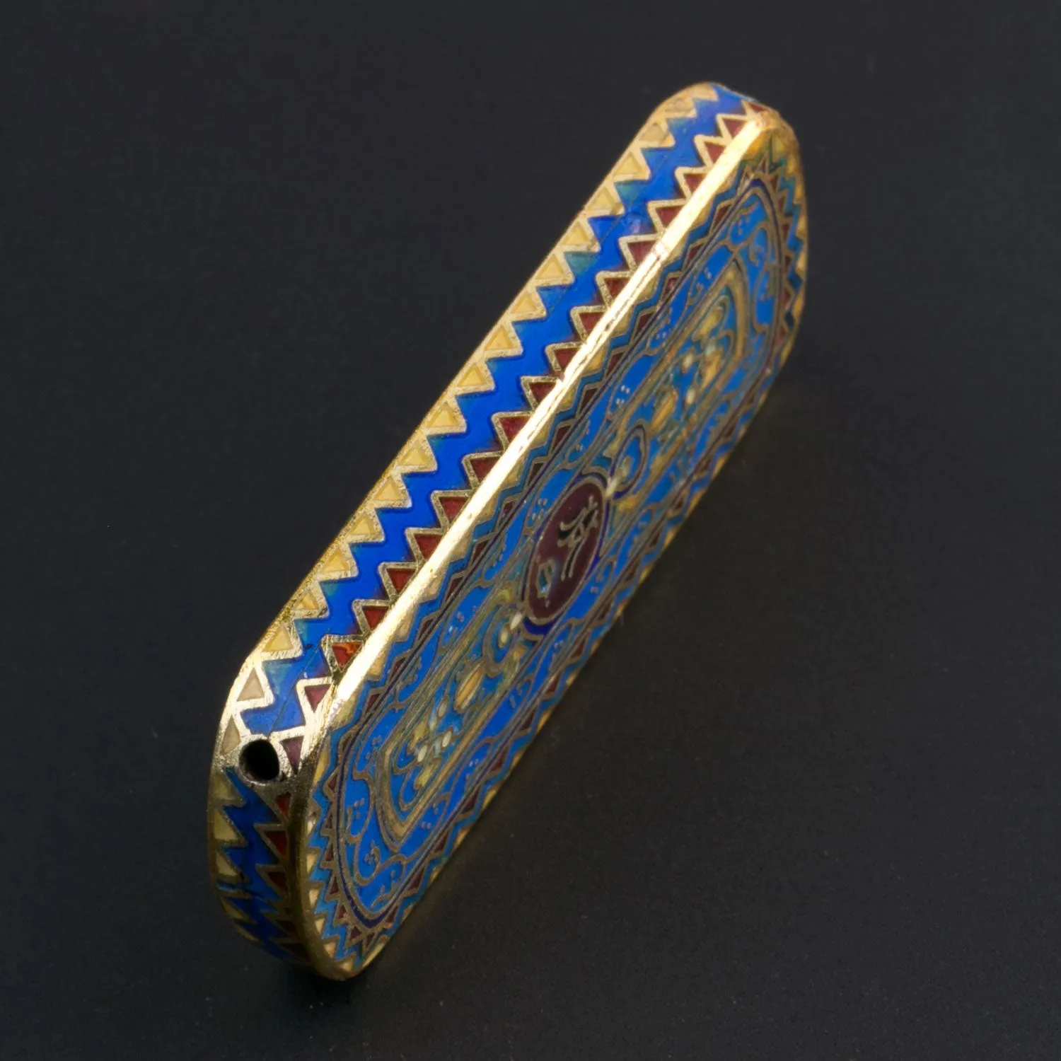 Cloisonné pendant. with blue and red enamel and gilt wire 50x23mm. Sold individually. b2-640
